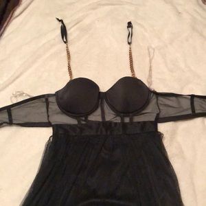 Black w/ gold chain prom gown. Duel split in front with mesh covering.